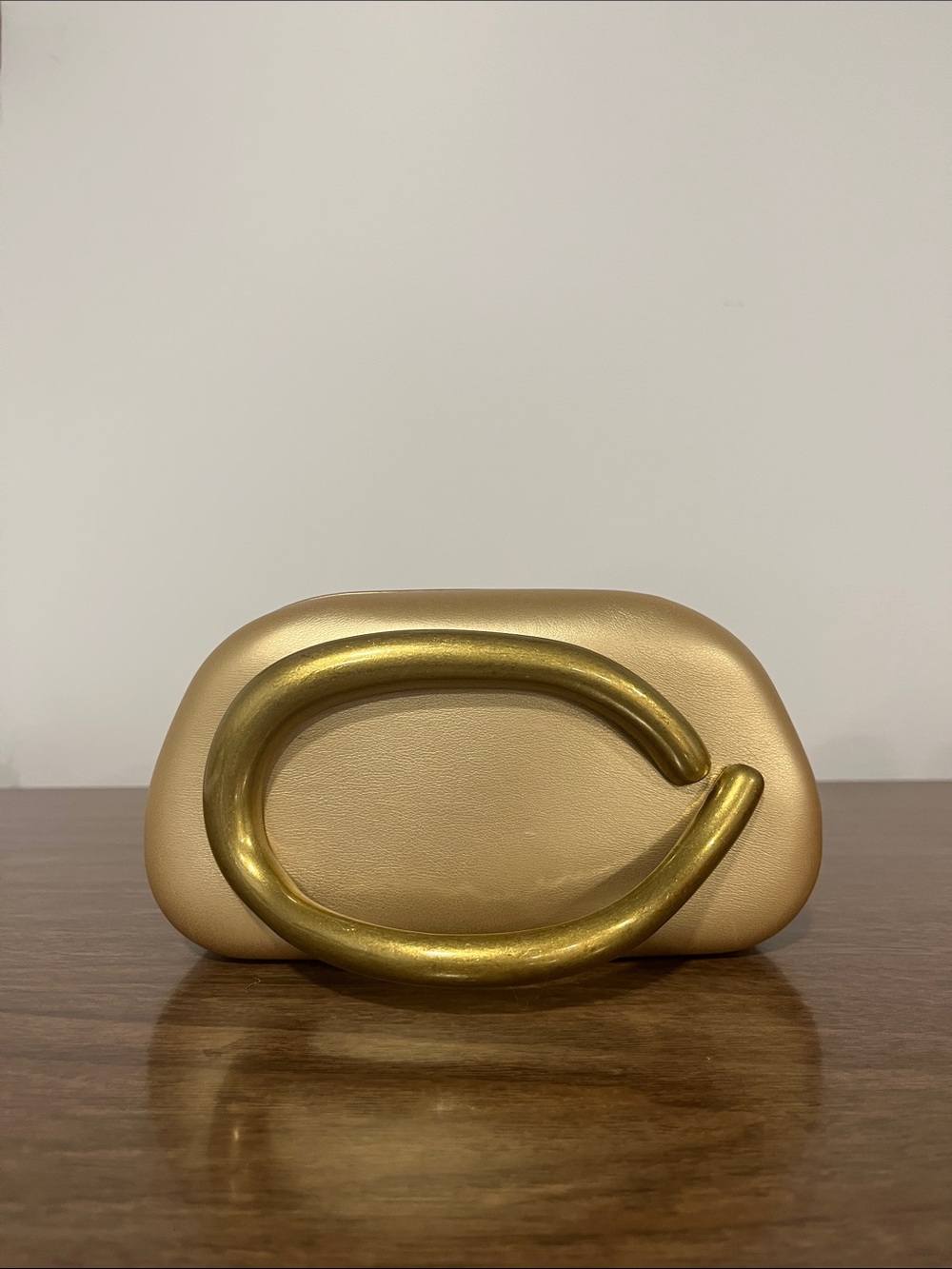 Gold Metallic Sculptural Clutch with Decorative Loop